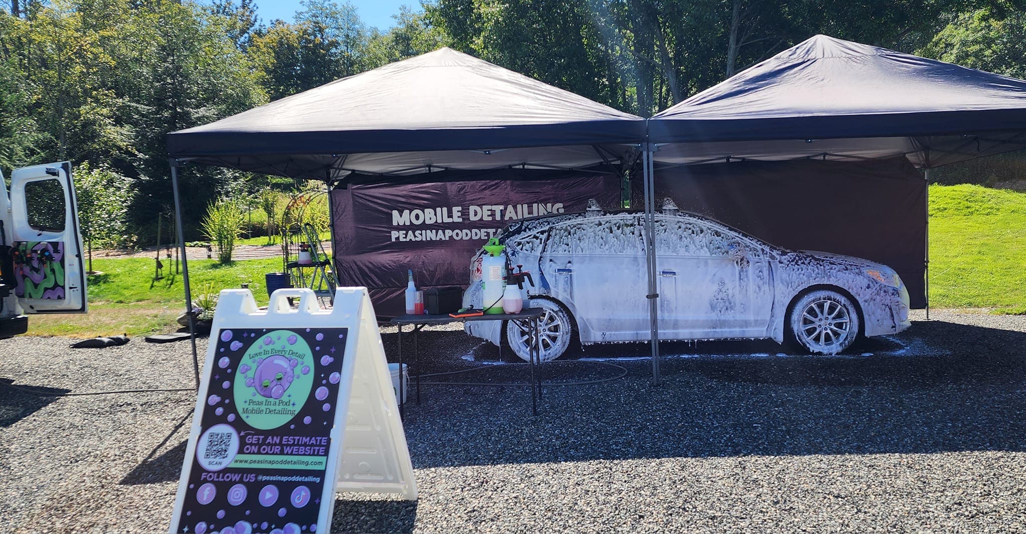 a vehicle covered in suds