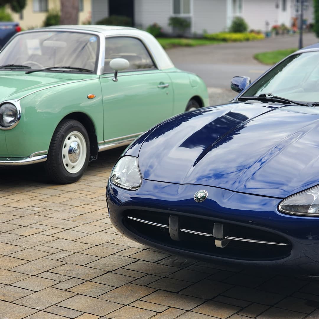 two clean fancy cars
